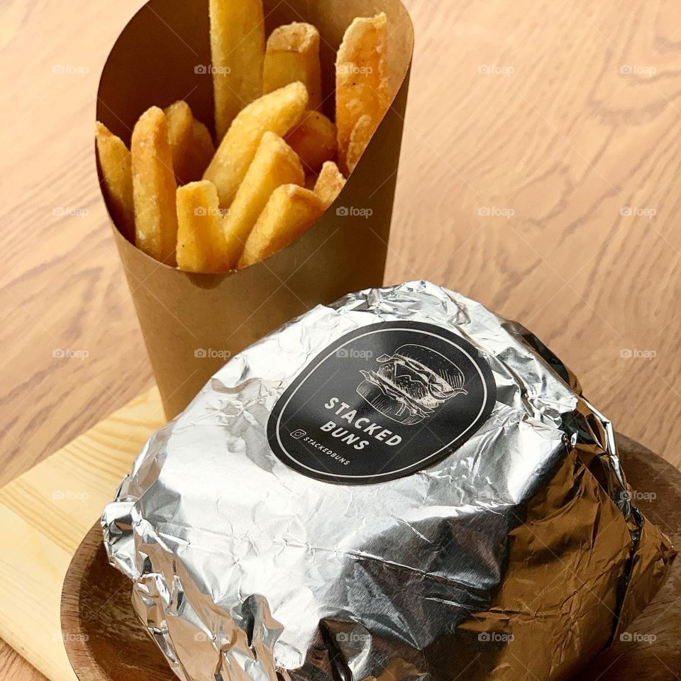 Peranankan styled chicken rendang burger with thick chunky fries 