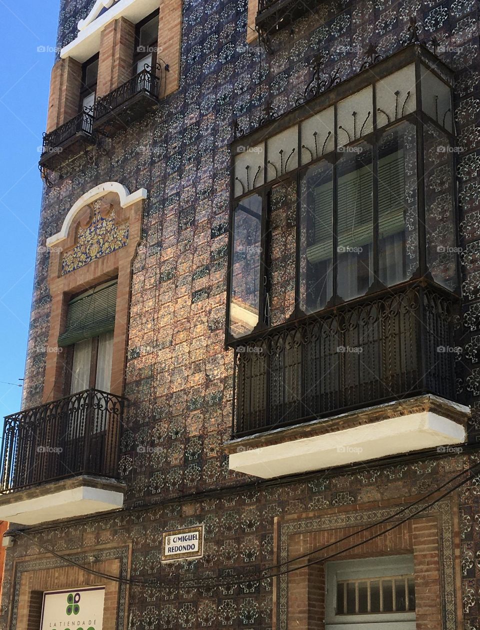 Mosaic wall on traditional house