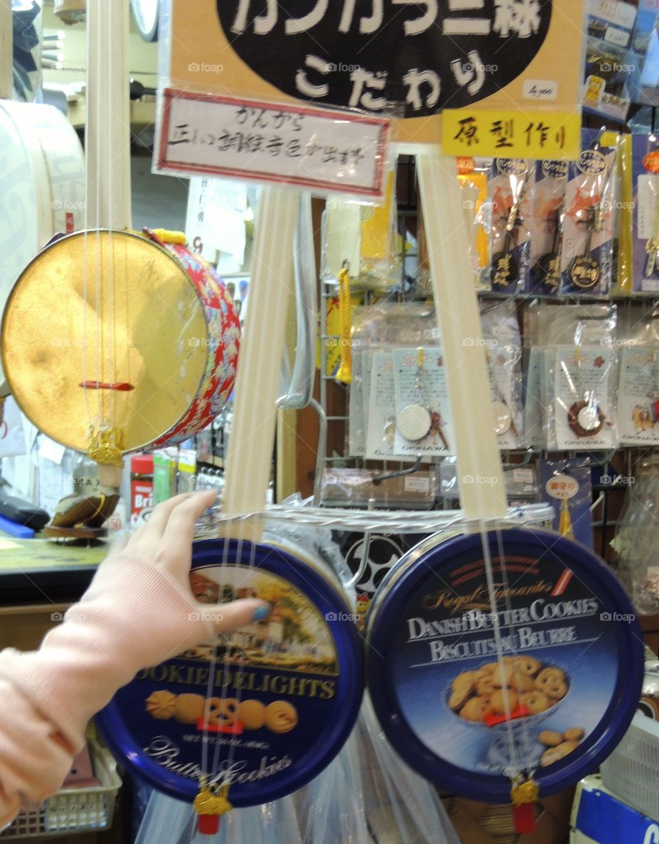 Tin can sanshin Japanese guitars. 3 guitars made from cookie tins 