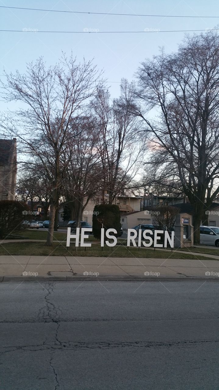 he is risen quote on chicago street by church