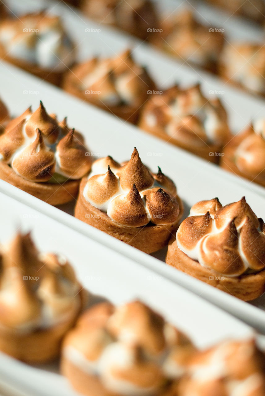 Rows of individual desserts