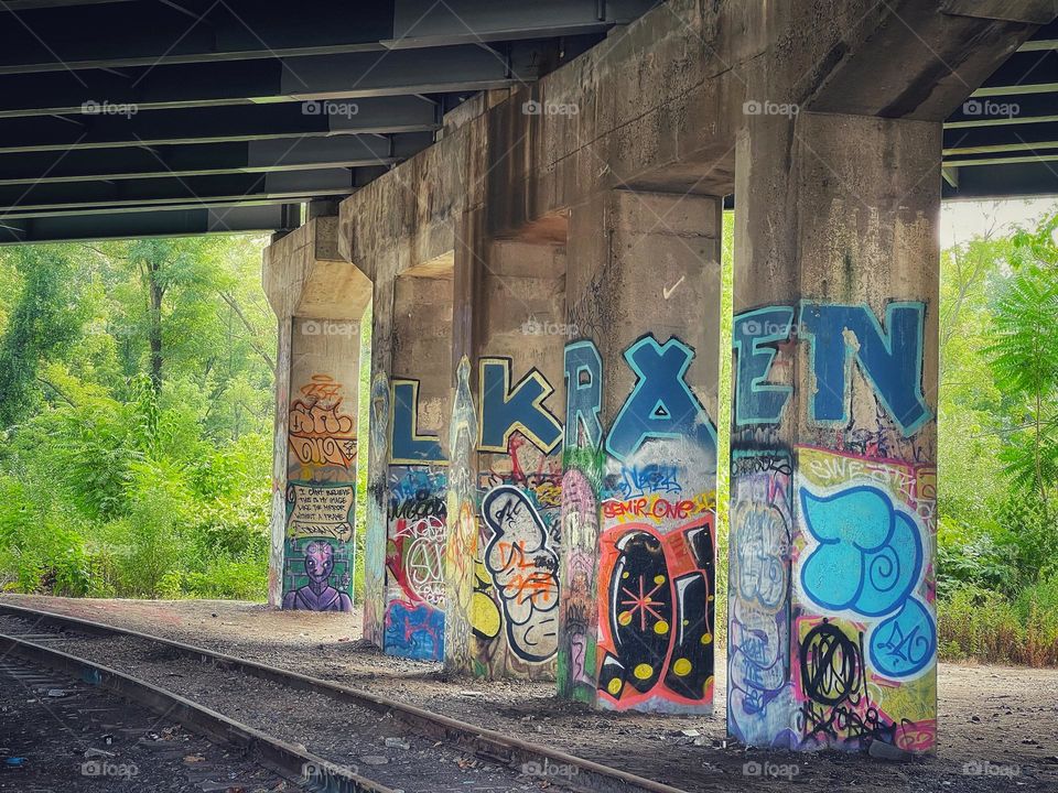 Graffiti beneath the highway 