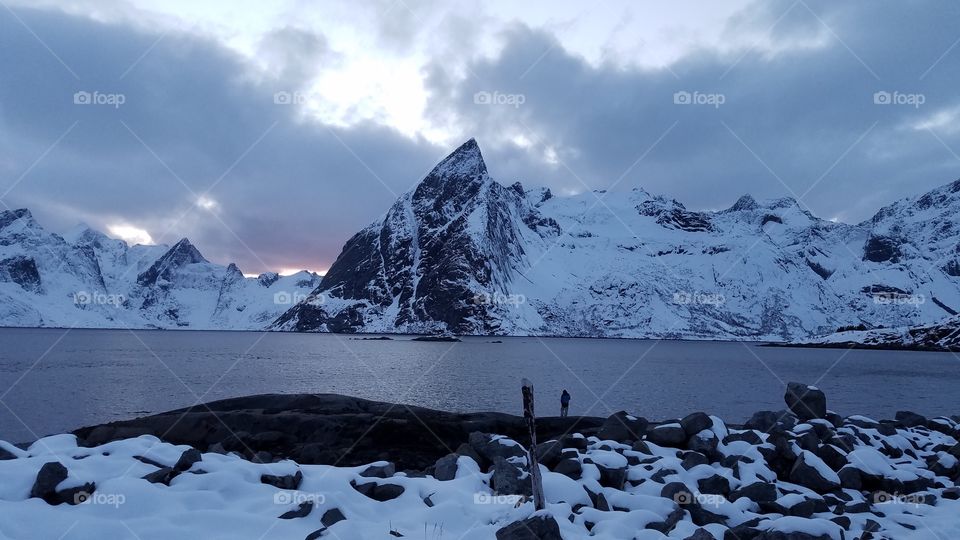 Sunset at snowy Fjords