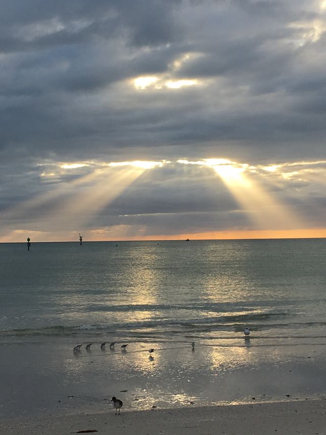 Sun breaking through the sky