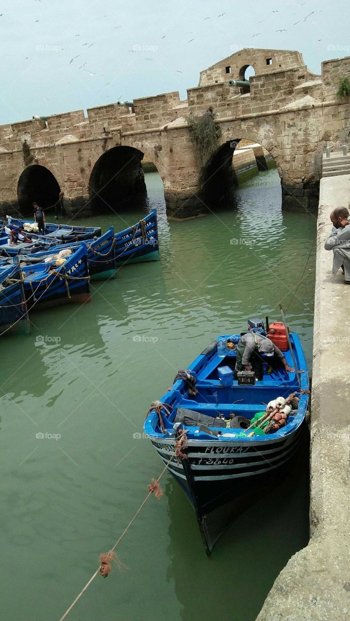 Beautiful blue boats in harbour at essaouira city in Morocco.