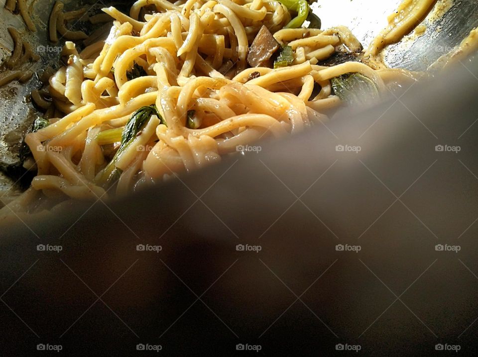 Fried noodles on the pan