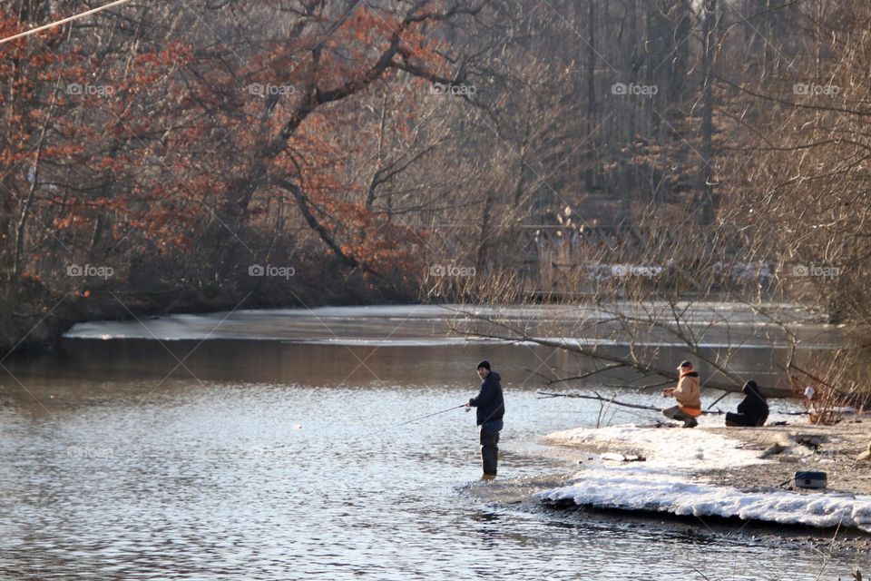 Fisherman in early spring 