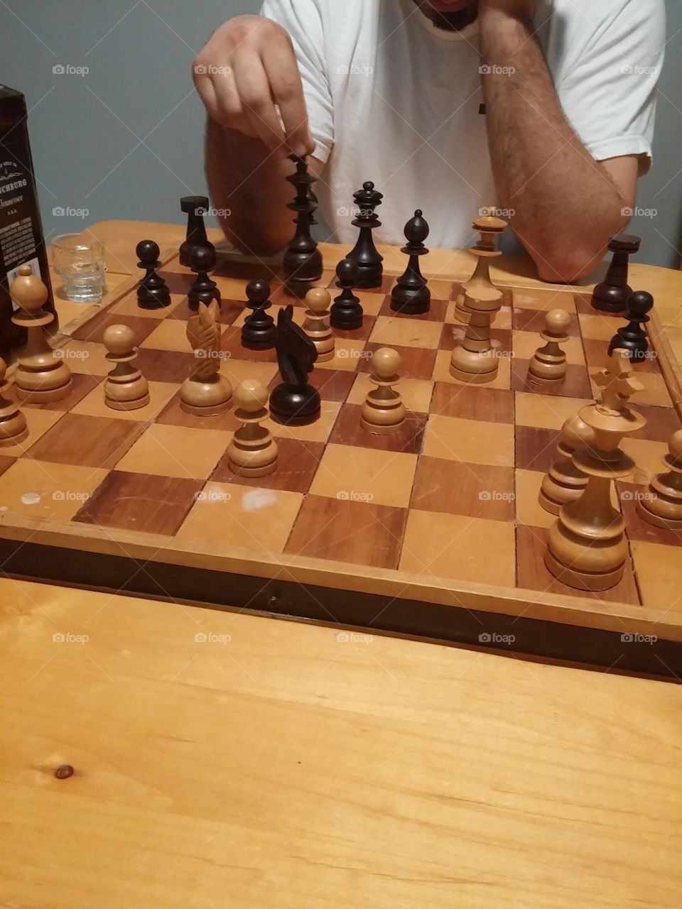 Chess & Jack Daniels . Drinking and playing chess with a friend 