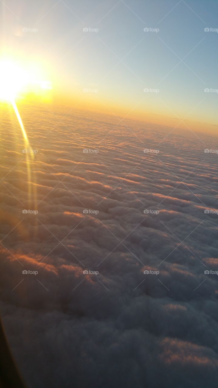 sunset set from above the clouds