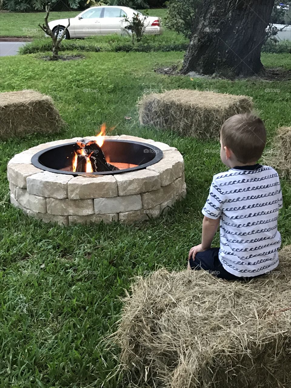 Child at a campfire 
