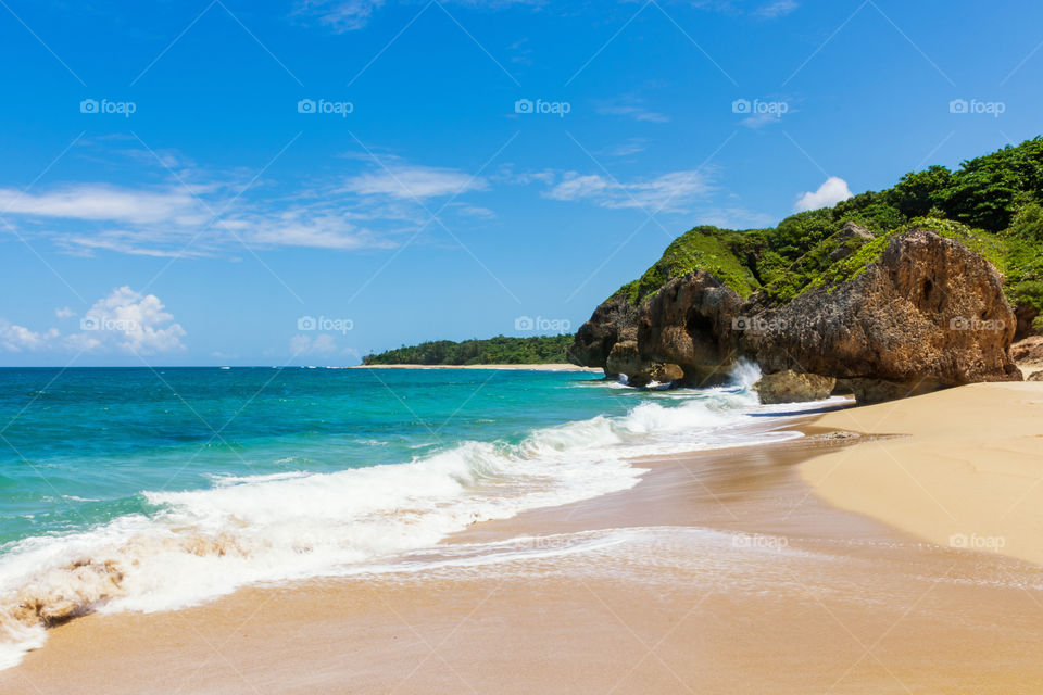 Survival Beach in Aguadilla is an excellent beach for fans of surfing, exploring caves and rock climbing.