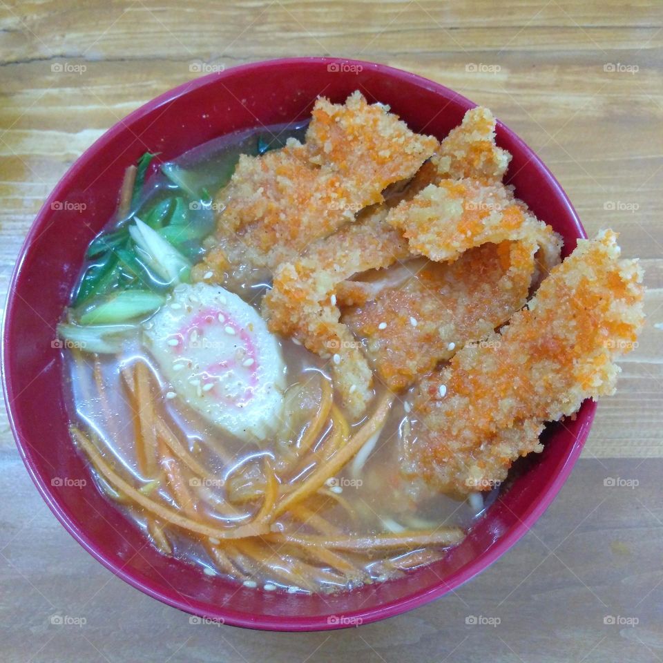 Delicious chicken ramen on table