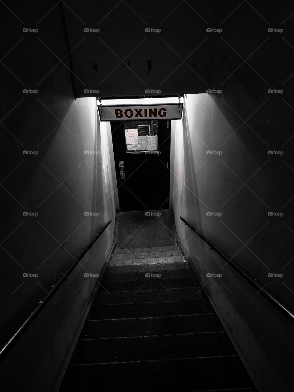 dark stairway to a boxing gym