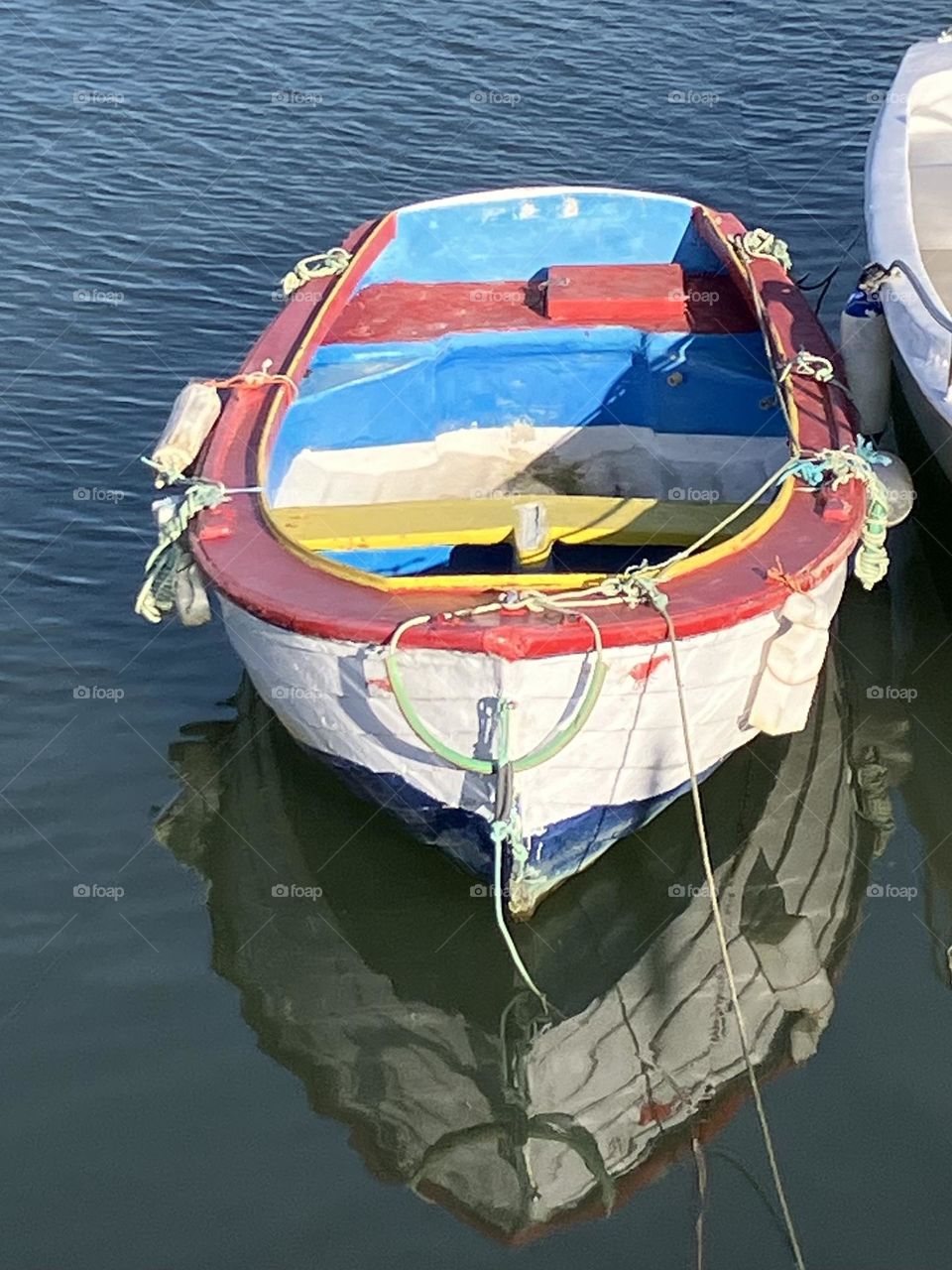 Colourful boat on the water