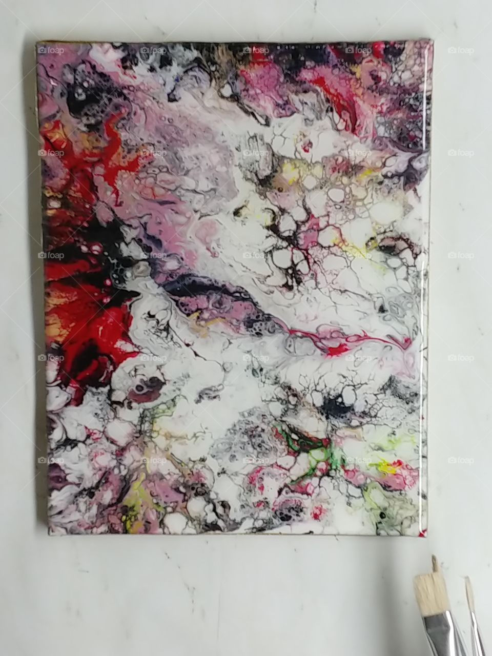 wall art with abstract desgins from an acrylic pour. multicolored!