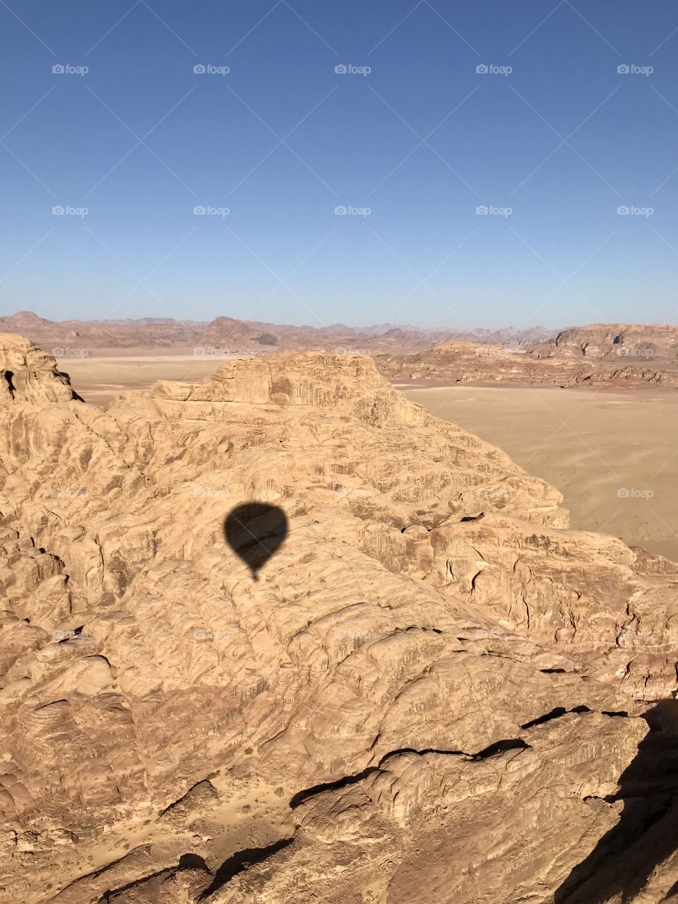 Flying over desert. Hot-air balloon. Wadi rum desert. Jordan