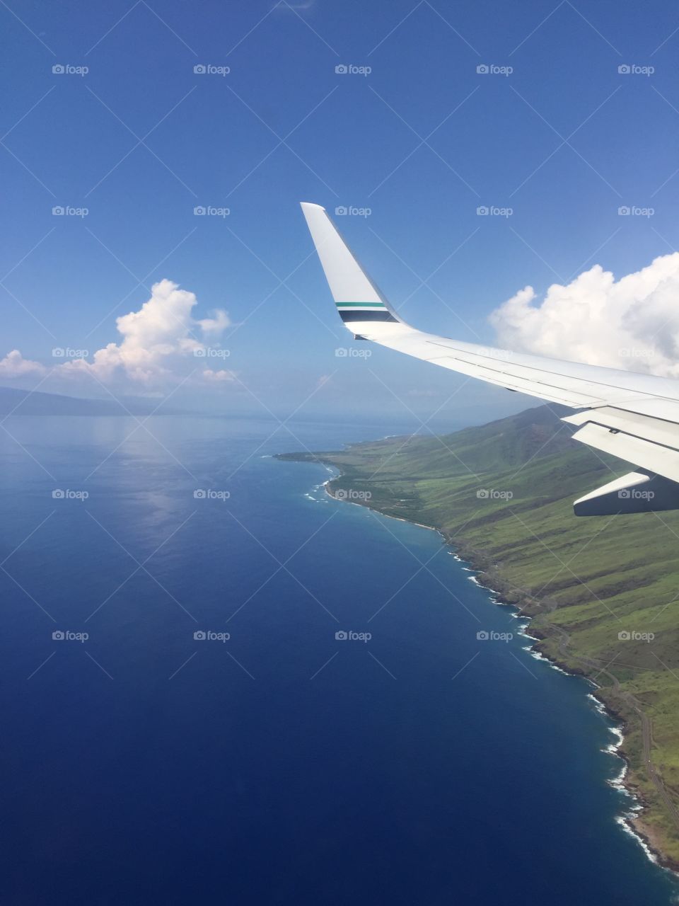 I see land!. Flying over the Maui coastline