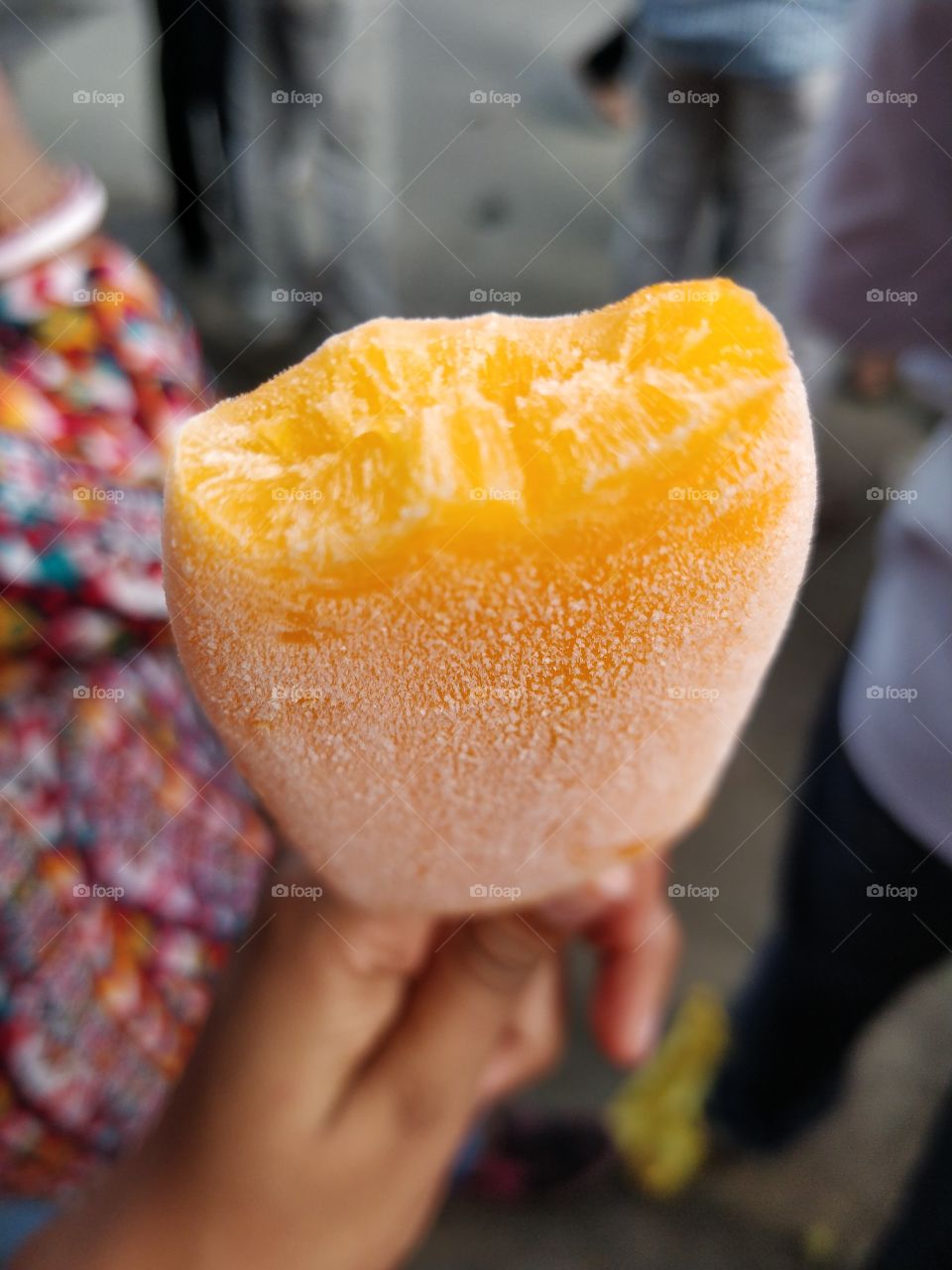 on a hot sunny day, an ice candy makes the day