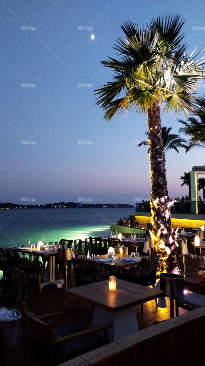 Amazing view at the restaurant in front of the sea under the sky