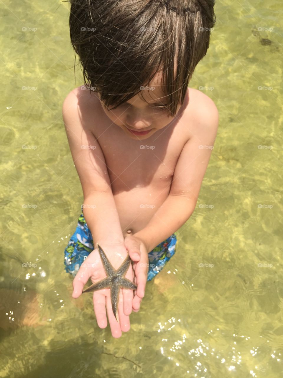 Boy with Starfish