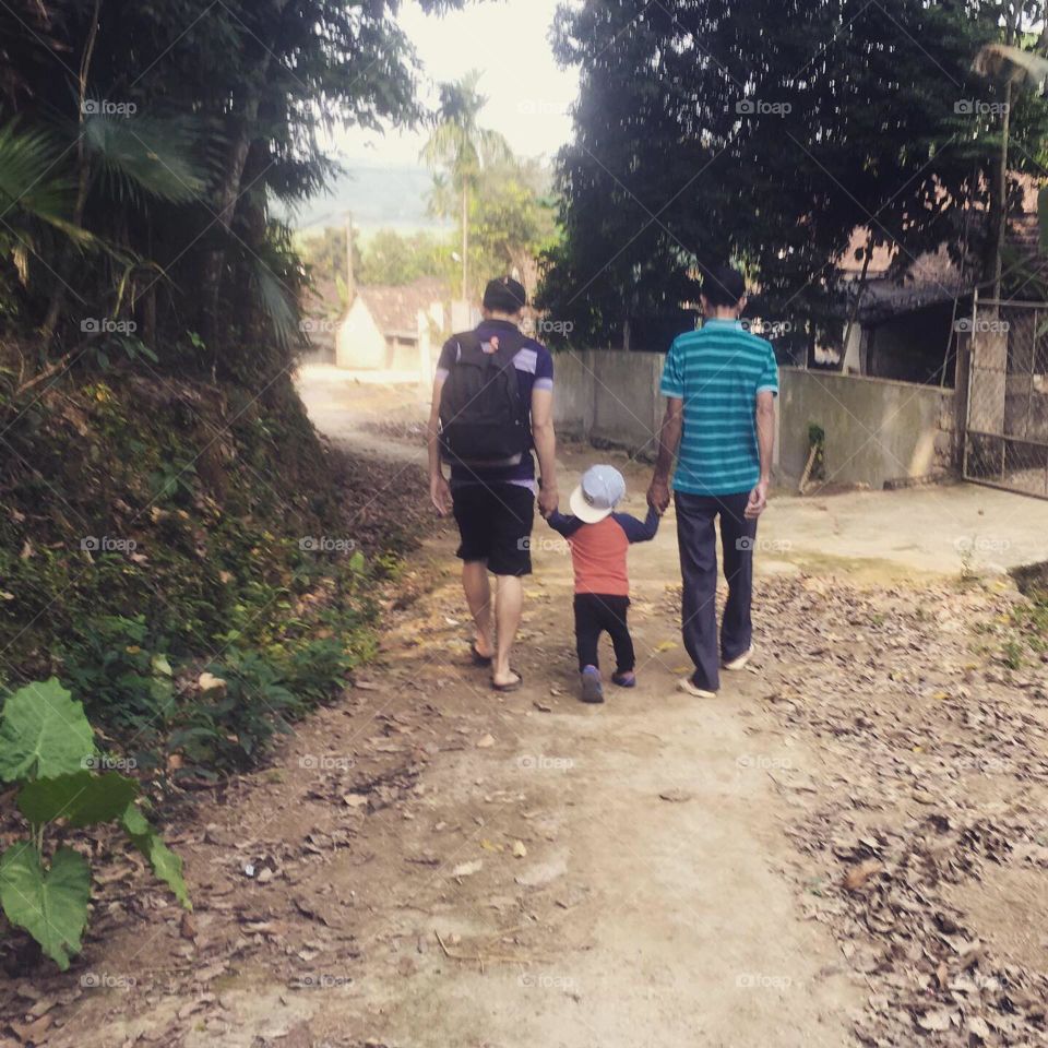 There are two fathers and two sons in this picture.