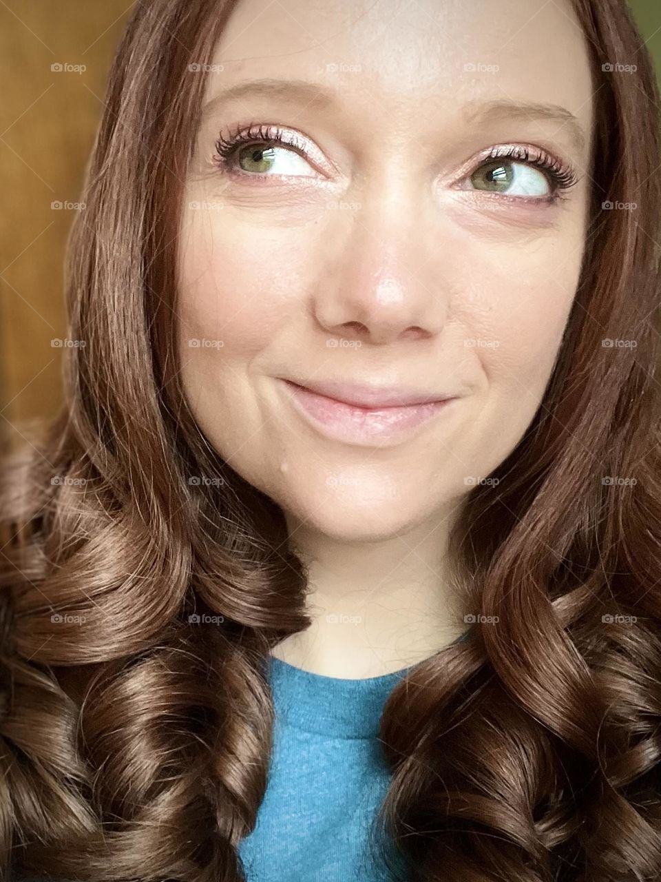 Green eyed woman smiling 