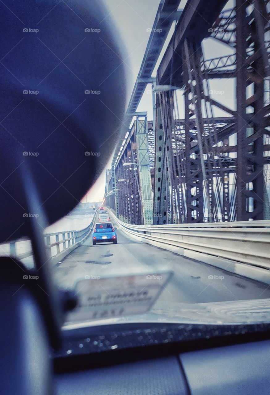 In a car across the bridge
