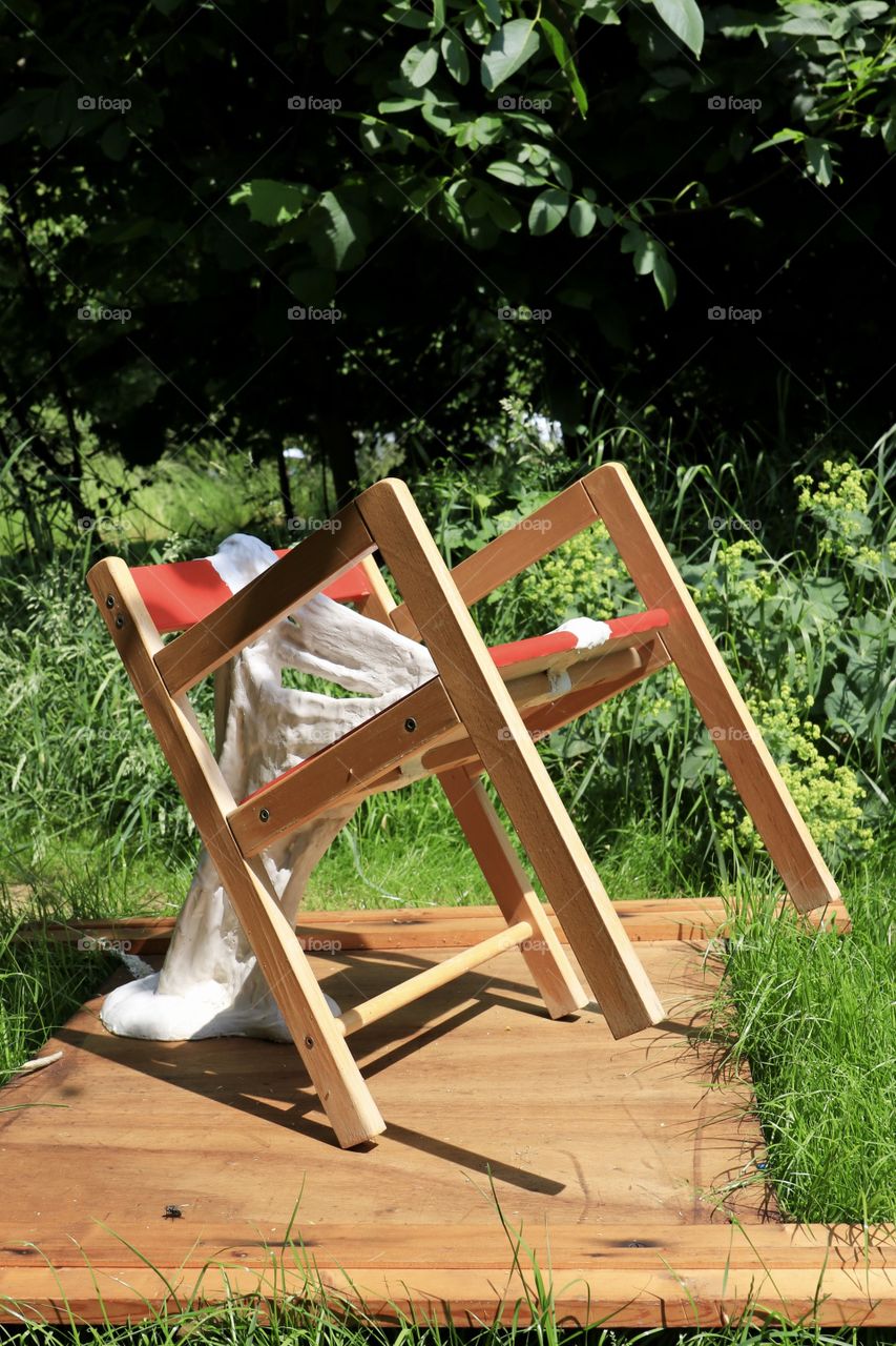 Dirty chair outside in sunlight 