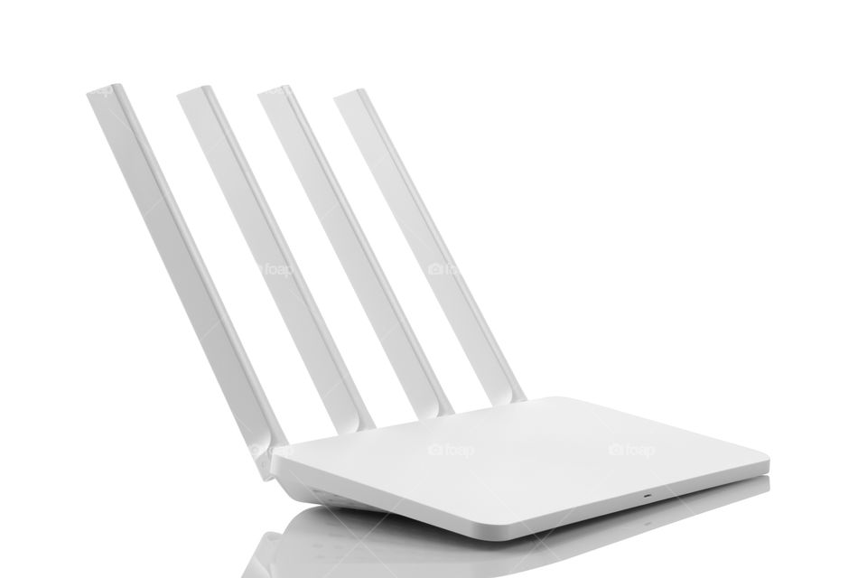 White colored wireless WiFi modem router 4 antenna