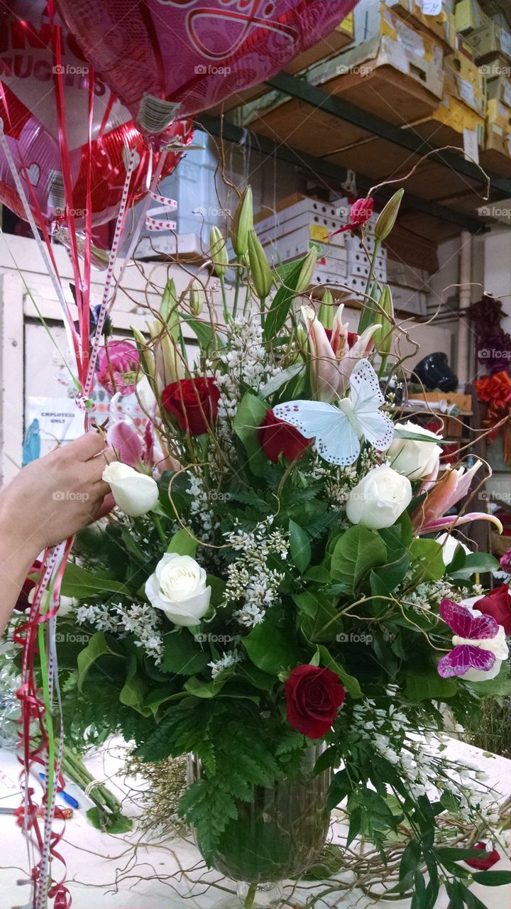Red and white roses,  stargazer Lillys, Genesta, butterflies and balloons