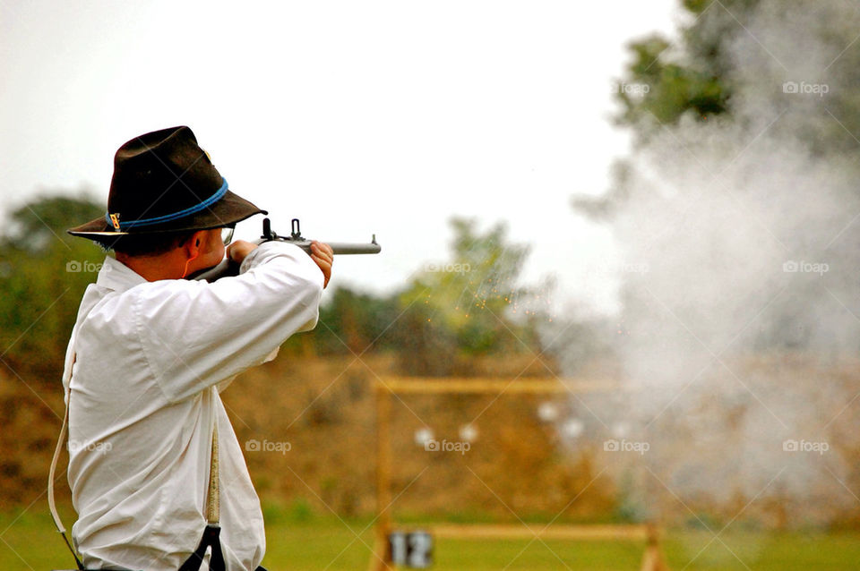 man shooting gun pleasant hill ohio by refocusphoto