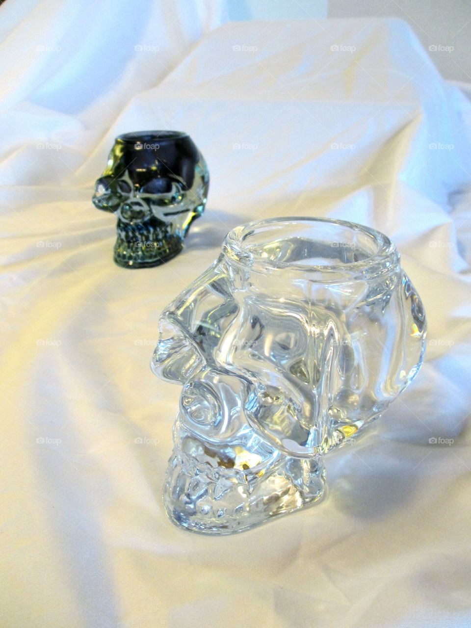 Crystal skulls. Pair of crystal skulls