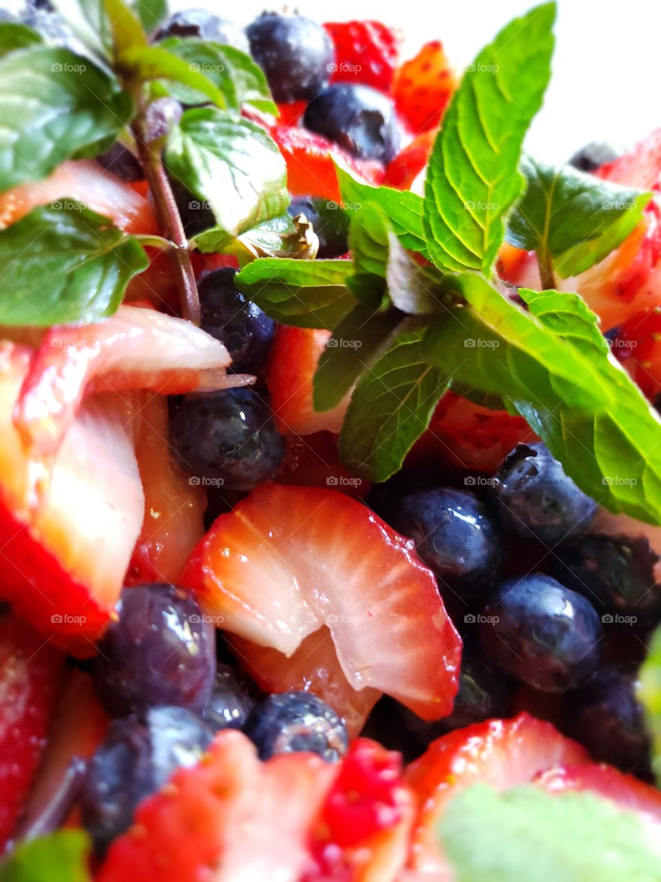 strawberries blueberry mint