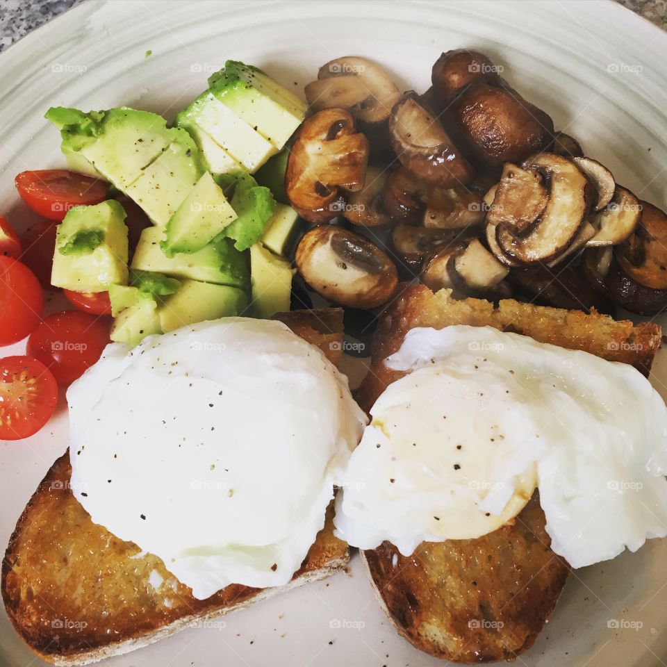 Brunching - eggs, sourdough, avocado, mushrooms and tomato