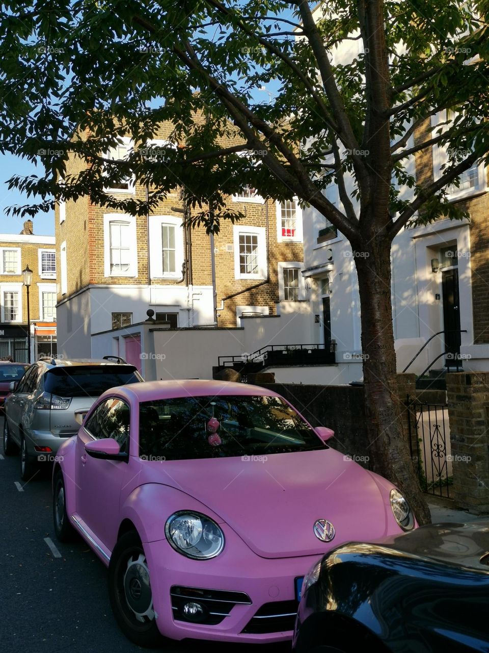 Car with soul. Pink car. London. Street photo.