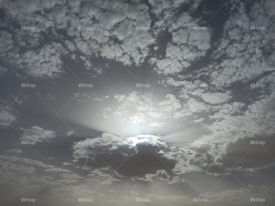 Does the sun want to hide or is the cloud chasing it to block it ?