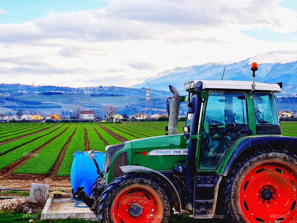 tractor in countryside landscape