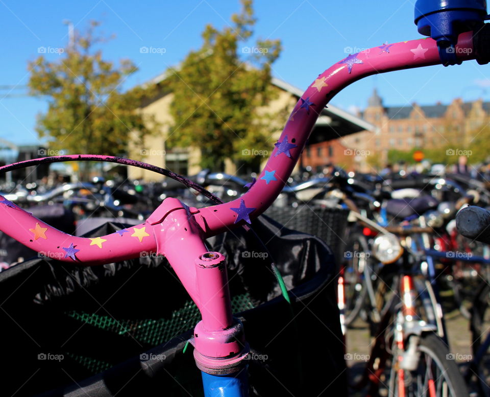 Close-up of pink bicycle