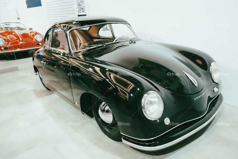 Black porsche.  Classic car.  The car that started it all.