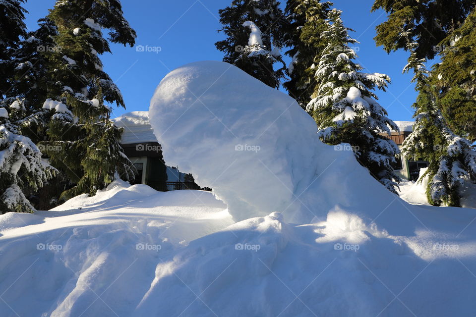 Snow made sculpture on a roadside 