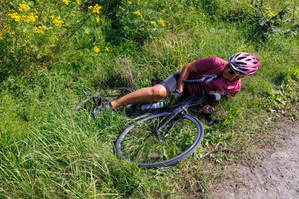 A pro biker at the race ,Fell but get up again but Fell over again and again . ❤️🧡💛💚💙💜