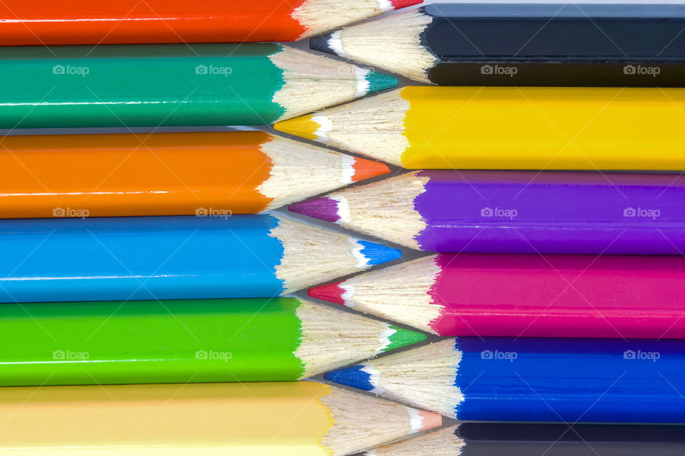 Multicolored childrens pencils, top view