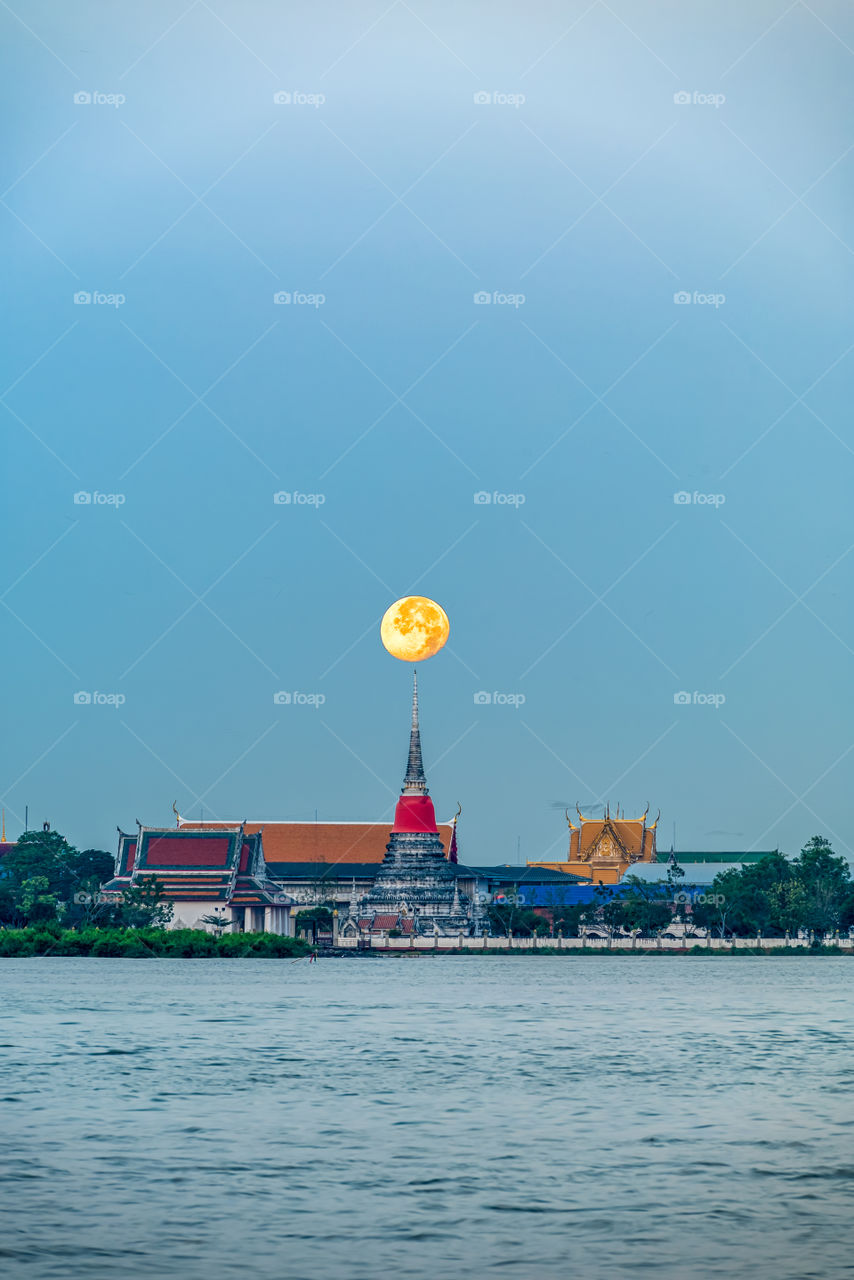 Beautiful Thai temple on the river scene