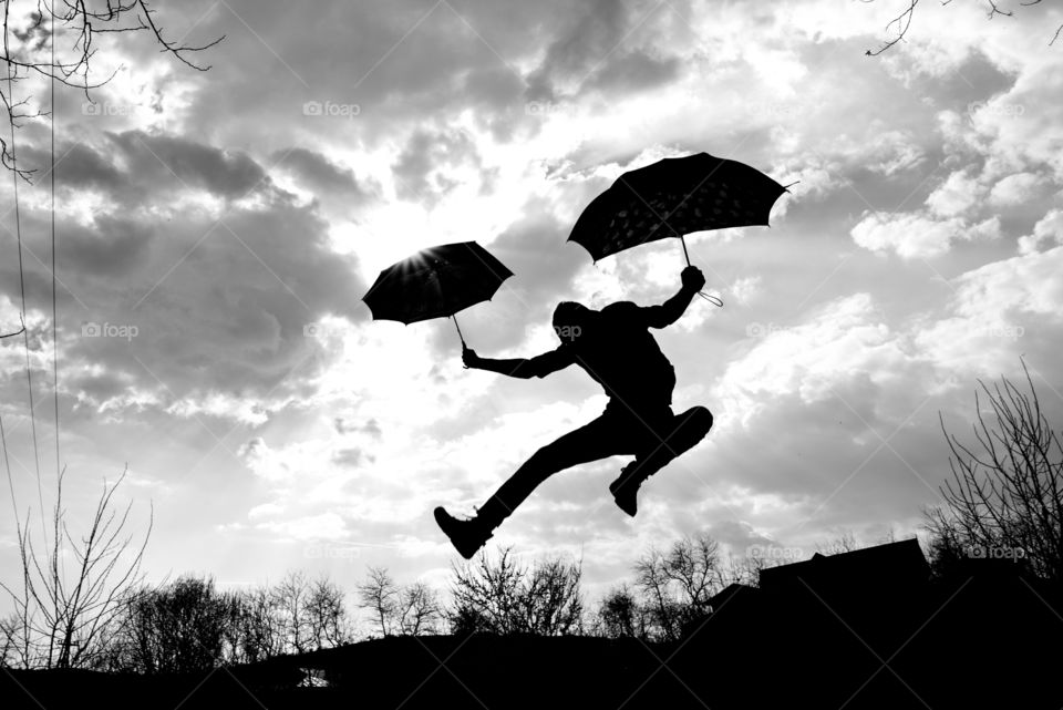 Silhouette of a man jumping