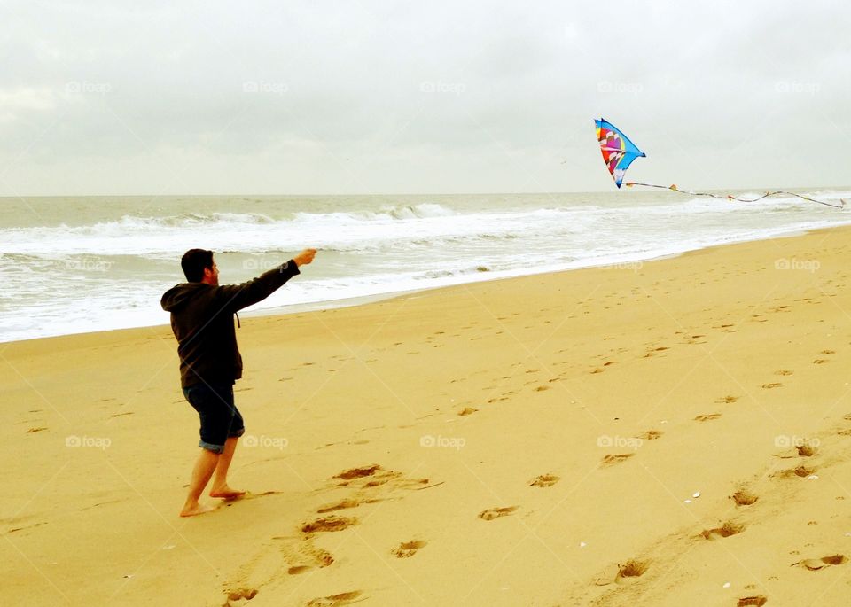 Fly a kite. Kite flying on the beach