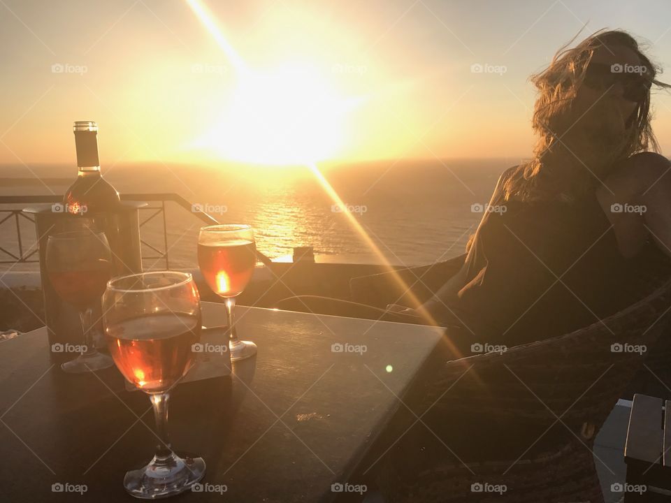 Santorini sunsets with friends are unmatched