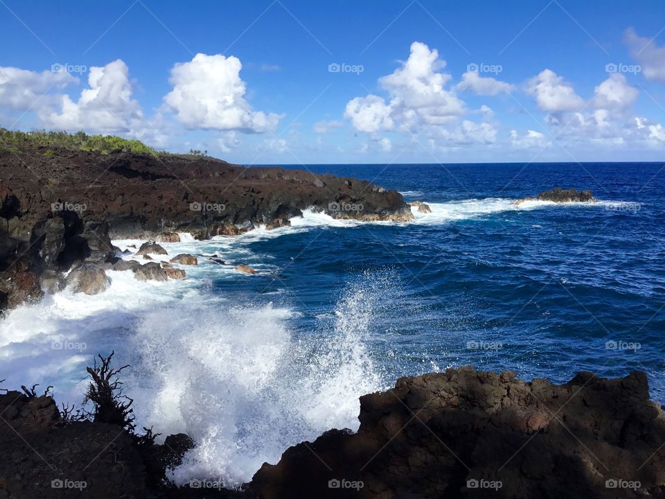 Blue skies, waves, and lava