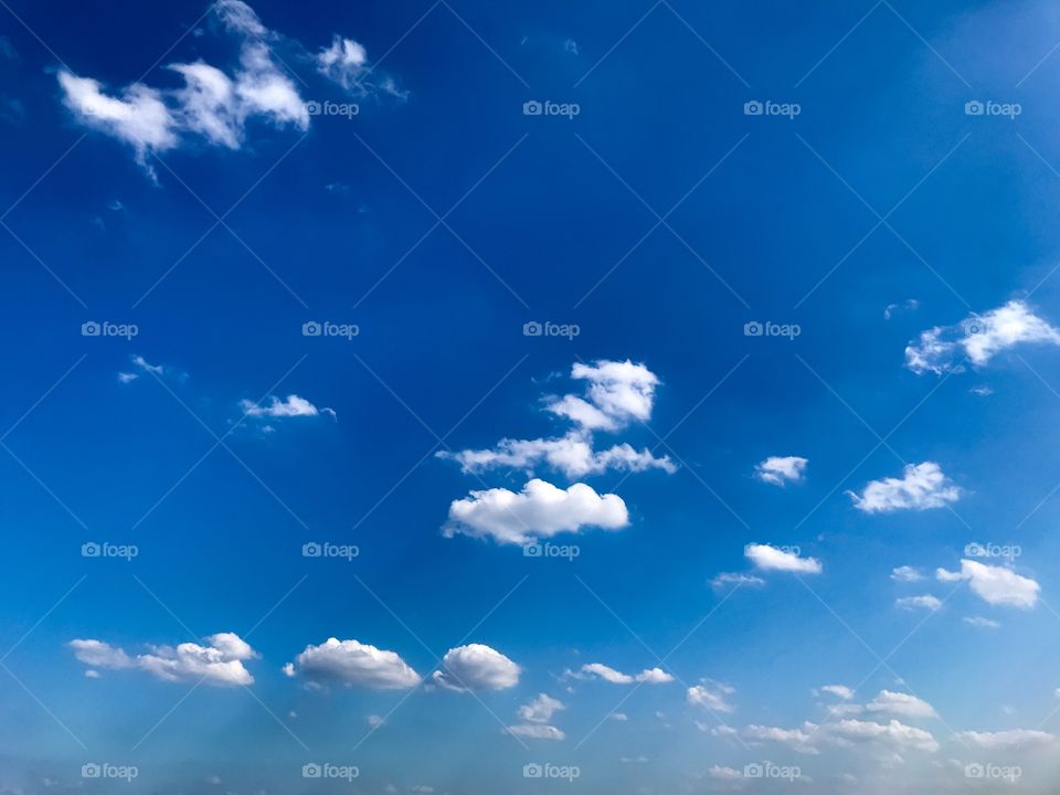 Blue sky with little white clouds 
