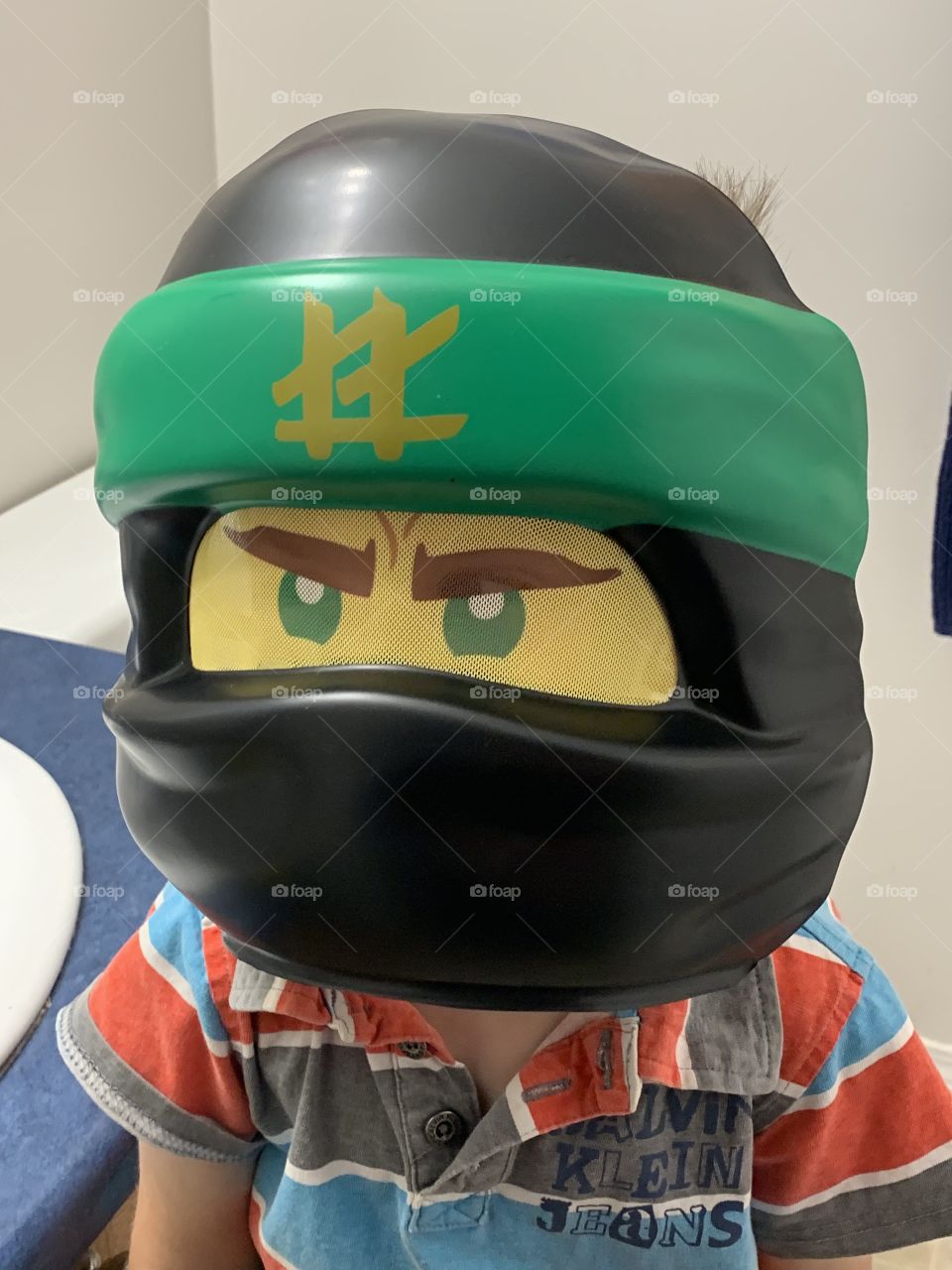 Child with a LEGO mask 