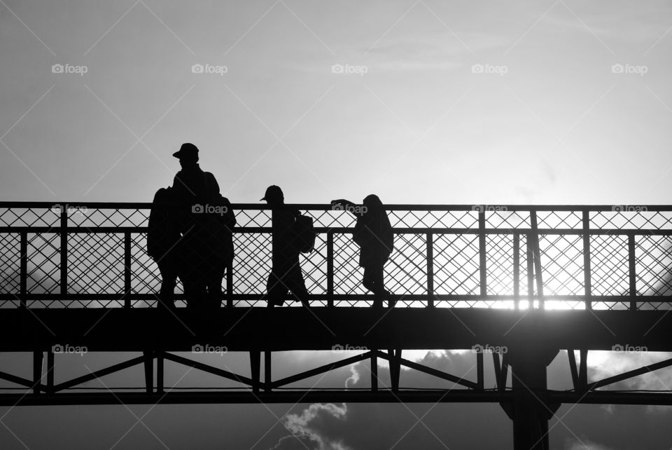Silhouette on Bridge